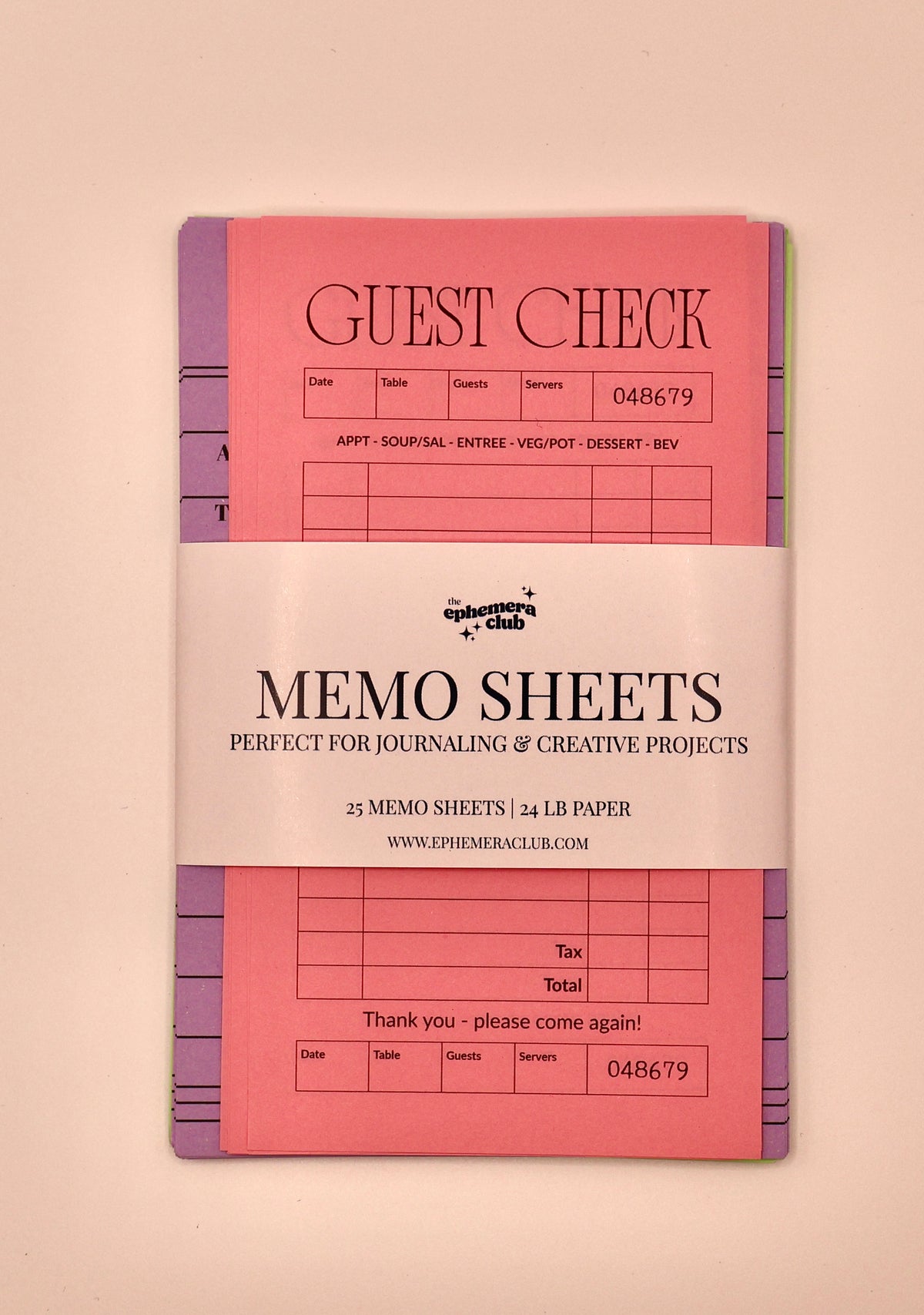 A pink memo sheet set with purple and green tabs, wrapped in a white paper band that reads 'Memo Sheets' and shows the brand 'The Paper Club'.