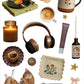 A cozy autumn-themed collage of seasonal items on a white background, including a record player, mug, coffee cup, candle, headphones, tube, camera, cat, and embroidered cloth, with the text 'Cozy Autumn' at the top and 'ephemera club' at the bottom right.